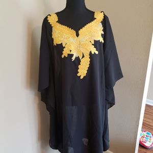 Embroidered crepe dresses